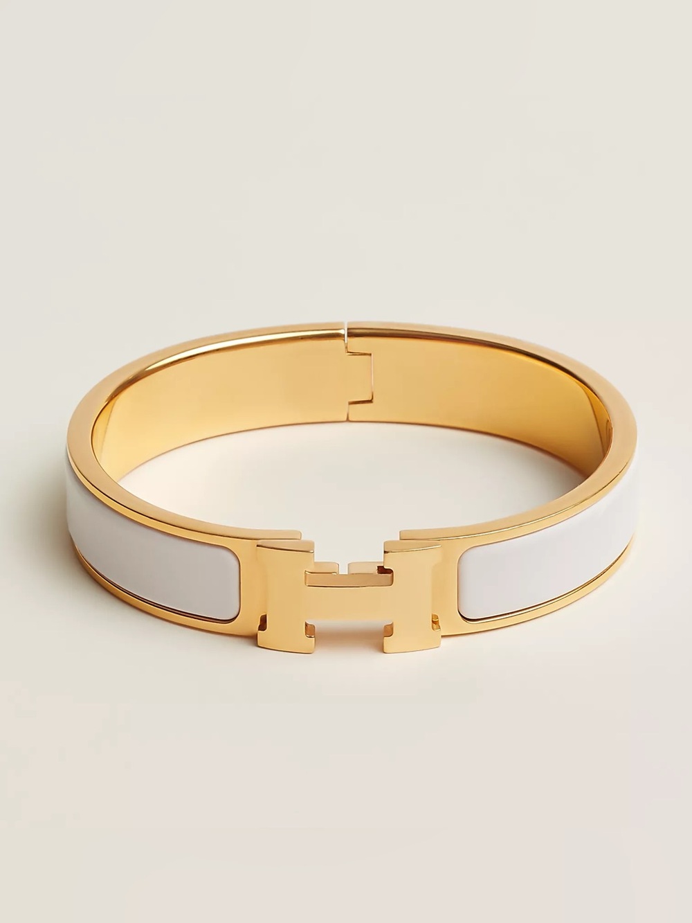 HERMÈS WHITE AND GOLD CLIC H BRACELET // SIZE PM✨